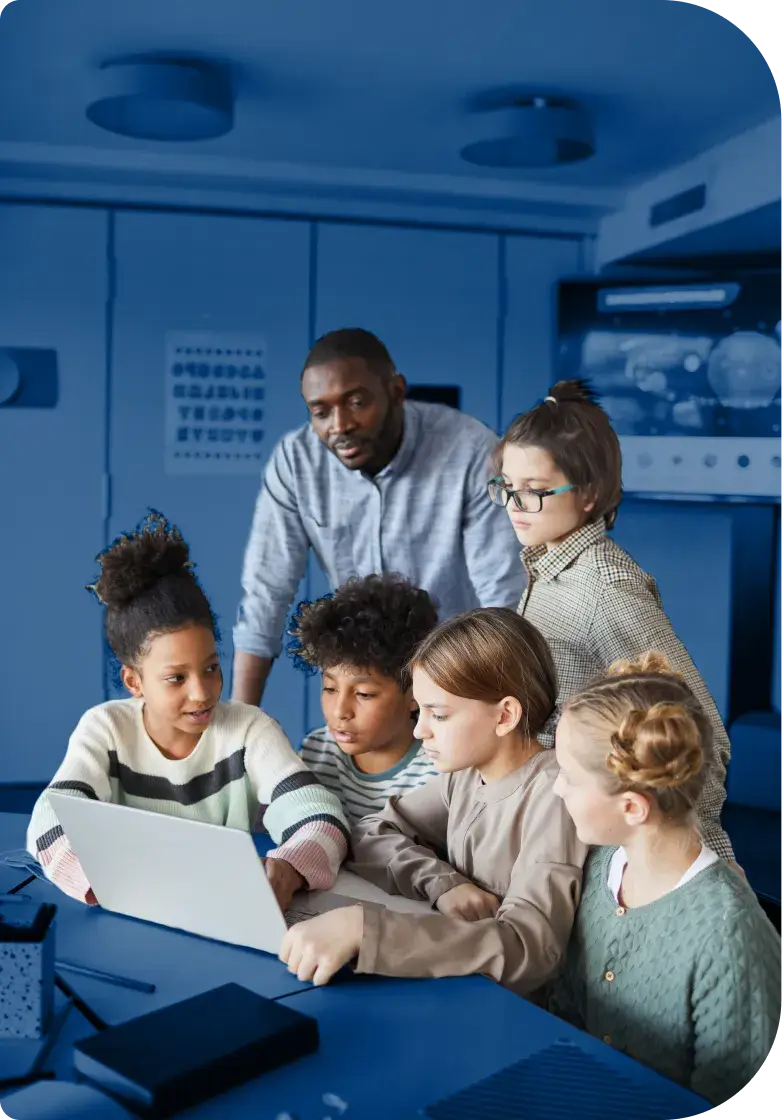 Teacher guiding students on a computer screen